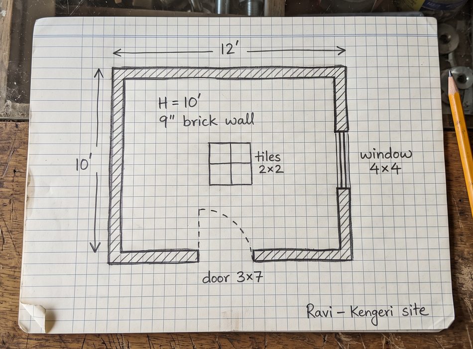 Pencil sketch of a 12 by 10 ft room on graph paper, lying on a shop counter